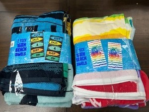 lot 319 image: 2 New 2 Packs  4 Youth Beach Towels 2 Keep Calm & Surf On & 2 Unicorns