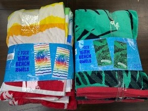 lot 320 image: 2 New 2 Packs  4 Youth Beach Towels 2 T-REX & 2 Unicorns