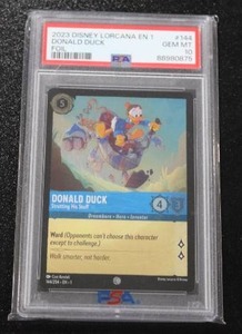 lot 8 image: 2023 Disney Lorcana EN 1 Donald Duck Foil #144204 PSA 10