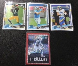 lot 55 image: 2023 Rookies & Stars Thrillers Red Jahmyr Gibbs w 3 Optic Rookie Card Stars Lot