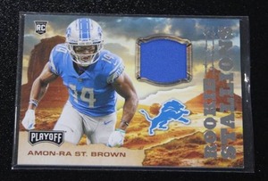 lot 56 image: 2021 Playoff Rookie Stallions Jersey Relic Amon-Ra St. Brown Rookie Card
