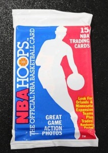 lot 85 image: 1989-90 Hoops Basketball Unopened Pack  Magic Johnson on Front - Hakeem Olajuwon on Back