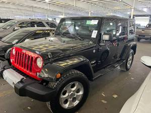 lot 6 image: 2014 Jeep Wrangler Unlimited Sahara 4x4