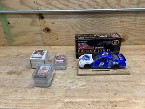 lot 65 image: NASCAR Racing Champions Premier Gold 118 Scale Miller Lite Collectable Car with Collectable Nascar Trading Cards