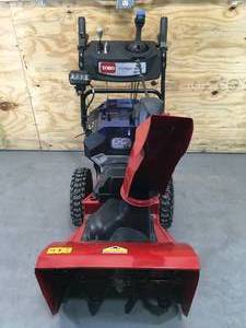 lot 21 image: Toro 24 Two Stage Snow Blower Model # 39924 - Tool Only