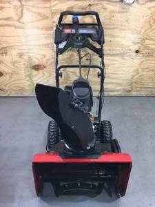 lot 4A image: Toro Snow Master 24 Gas Powered Snow Blower Model # 36002 (Retails for $1099)