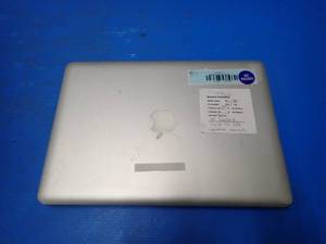 lot 51 image: Apple&nbspMacBookPro9,2 A1278 &nbspINTEL CORE I5-3210M 1.2 Ghz  4GB DDR3 SDRAM  500GB HD  13.3 screen with 1280 x 800 HD Resolution  Includes IOS and Charger &nbspeth port is bent, several small dents, heavy wear, lots of minor stuff