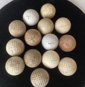 Group of Vintage Golf Balls and Tees
