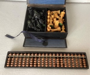 Vintage Chess Set and Modern Abacus