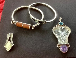 Pair of Sterling Silver Bracelets and Pair of Sterling Silver Pendants