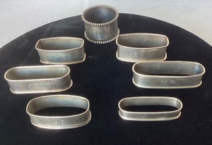 Group of 7 Vintage Sterling Napkin Rings