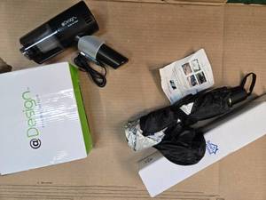 lot 28 image: Lot of 2 Items Windshield Umbrella Style Sunshade and Car vacuum Cleanerdust sucker), New