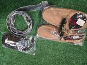 lot 50 image: A lot containing a pair of indoor soft and warm shoe (Size L) and 3 belts. All are new.