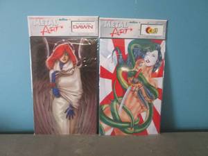 lot 17 image: 2 Rocket USA Metal Art Tin with Bac...