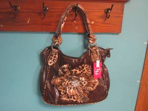 lot 76 image: New HBL Purse in Brown New with Tag...