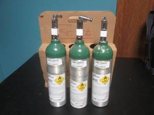 lot 121 image: 3 Empty Oxygen Tanks - Tanks are 1...