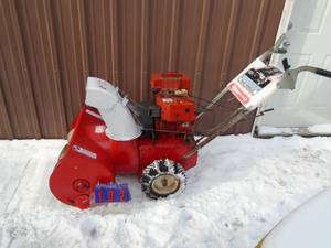 lot 102 image: Vintage Craftsman 726 snow blower with electric start. Good used condition. As shown.
