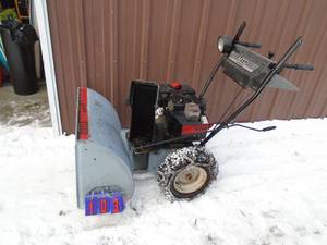 lot 103 image: MTD 826 Snow Blower. Used condition. As shown.