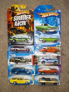 lot 293 image: Hot Wheel lot of GTO, Chevelle convertible wagon. All clean cards. As shown.