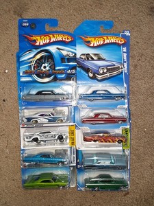 lot 302 image: Hot Wheels muscle car lot low riders Impala Chevelle. All clean cards. As shown.