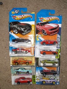 lot 306 image: Hot Wheel modern muscle Camero Firebird. All clean cards. As shown.