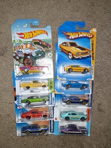 lot 309 image: Hot Wheels Ford muscle cars. Maverick, Falcon, Cougar, Mustang. As shown.