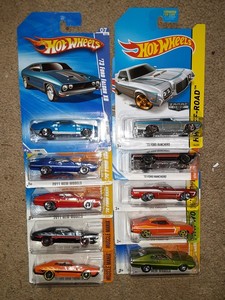 lot 310 image: Hot Wheels Ford Muscle Ranchero 1972, 1973 Torino Grand Sport Ranchero. All clean cards. As shown.
