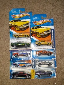 lot 311 image: Hot Wheels Ford muscle car 1969, 70 Mustang Mock 1. One bad card. As shown.