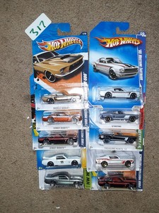 lot 317 image: Hot Wheels Ford muscle 1967 Ford Mustang 1965 GT500. One wrinkle rare variations.
