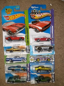lot 329 image: Hot Wheels GM Camero Monte Carlo El camino. One bad card. As shown.
