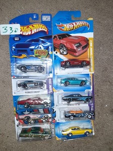 lot 330 image: Hot Wheels GM lot Corvette GTO Camero. All clean cards.