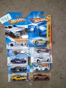 lot 331 image: Hot Wheels modern muscle lot challanger, firebird, mustang.