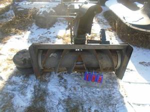 lot 103 image: Craftsman tractor snow blower. 50 with mounting  & pulley plus pair of weights. As shown. This item will fit lot number 104