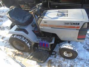lot 104 image: Craftsman 18 hp commercial twin 6 speed 44 deck. Consignor says it rums & drives. As shown.