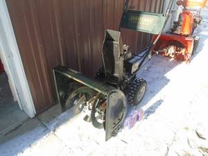 lot 105 image: Craftsman 524 snow blower with electric start. Used condition. Tested & works. As shown.