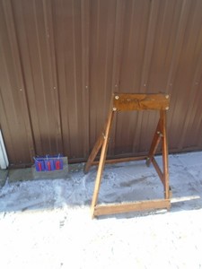 lot 110 image: Wood outboard motor stand. As shown.