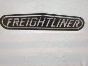 lot 10 image: Vintage Freightliner Metal Emblem Sign