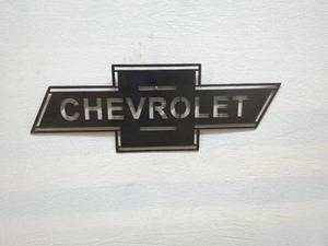 lot 17 image: Vintage Chevrolet Metal Emblem Sign