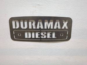 lot 26 image: Duramax Diesel Metal Sign for Garage or Shop Decor