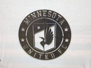 lot 77 image: Minnesota United FC Metal Wall Art Emblem - 16 Inch Diameter