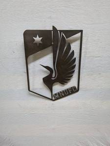 lot 94 image: Vintage Metal Wall Art featuring MN United FC Logo