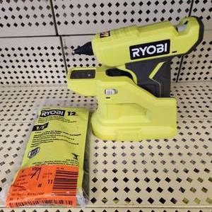 lot 24 image: Ryobi 18V P306 Glue Gun With Package Of Black Glue Sticks