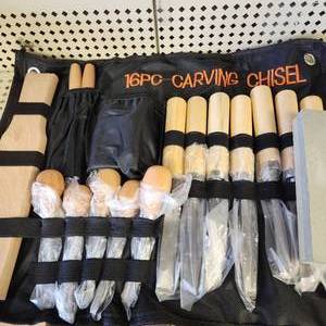 lot 62 image: New 16 Piece Wood Carving Chisel Set With Canvas Pouch