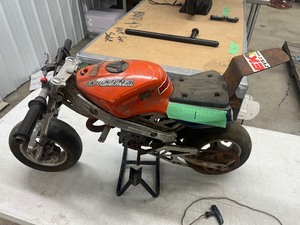 lot 1 image: 49cc Pocket Rocket needs recoil fixed Ran when last parked
