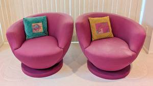 lot 8 image: Pair Vladimir Kagan for Directional Pink Nautilus Swivel Chairs