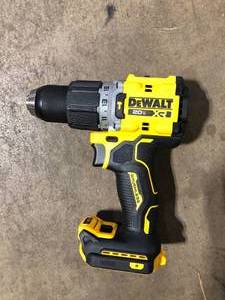 lot 10 image: DEWALT 20V Compact Cordless 12 in. Hammer Drill (Tool Only) Customer Returns See Pictures
