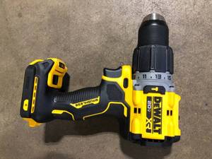 lot 43 image: DEWALT 20V Compact Cordless 12 in. Hammer Drill (Tool Only)  Customer Returns See Pictures