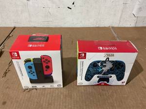 lot 278 image: Nintendo Switch Wired Controller and Joy Con Charging Dock