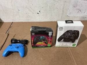 lot 279 image: LOT OF 2 PowerA Wired Controllers and Dual Charging Station
