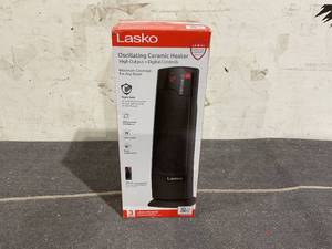 lot 123 image: Lasko 22 1500W Oscillating Ceramic Tower Space Heater with Remote, CT22835